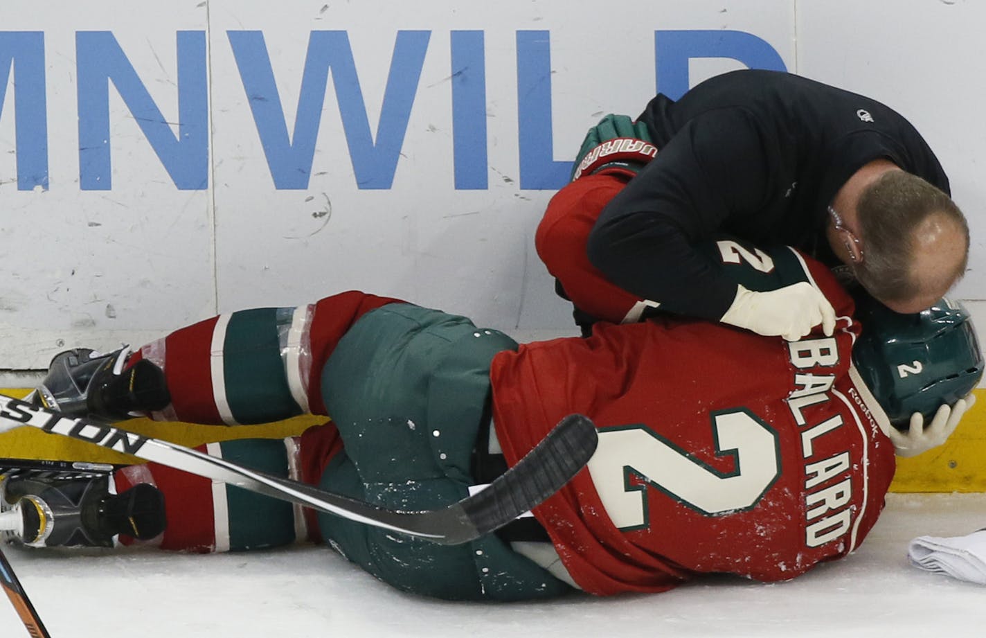 Keith Ballard was injuried in the second period and was helped off the ice.] in the Wild game at the Xcel Center against the New York Islanders.Richard Tsong-Taatarii/ rtsong- taatarii@startribune.com