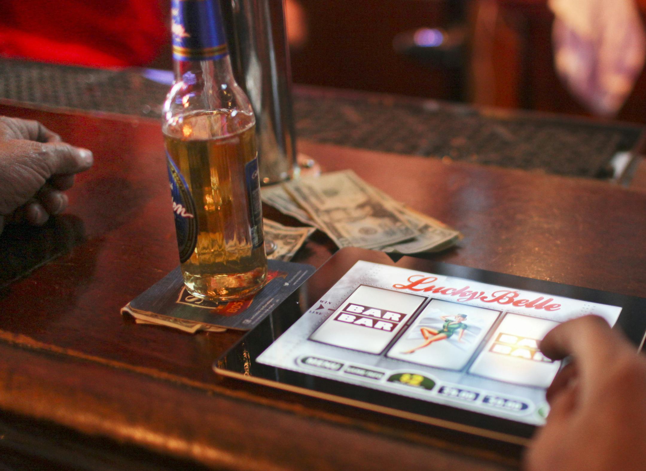 Dave Stokes of St. Paul plunked down $20 to play electronic pulltabs on Wendesday.
