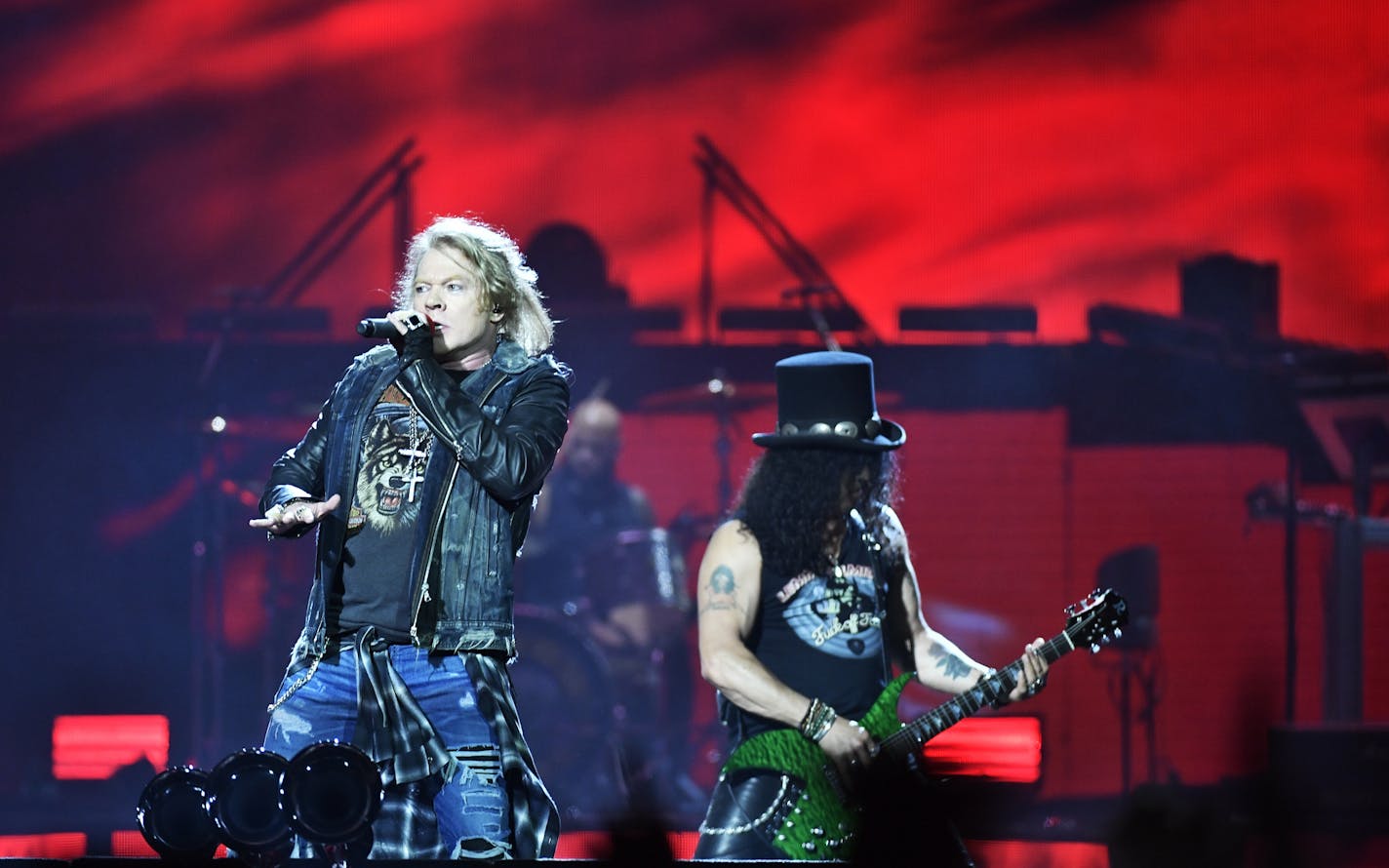 Axl Rose, lead singer, and Slash, guitarist of U.S. rock band Guns N' Roses, performs during a concert at Friends Arena in Stockholm, Sweden, Thursday evening, June 29, 2017. (Vilhelm Stokstad/TT via AP)