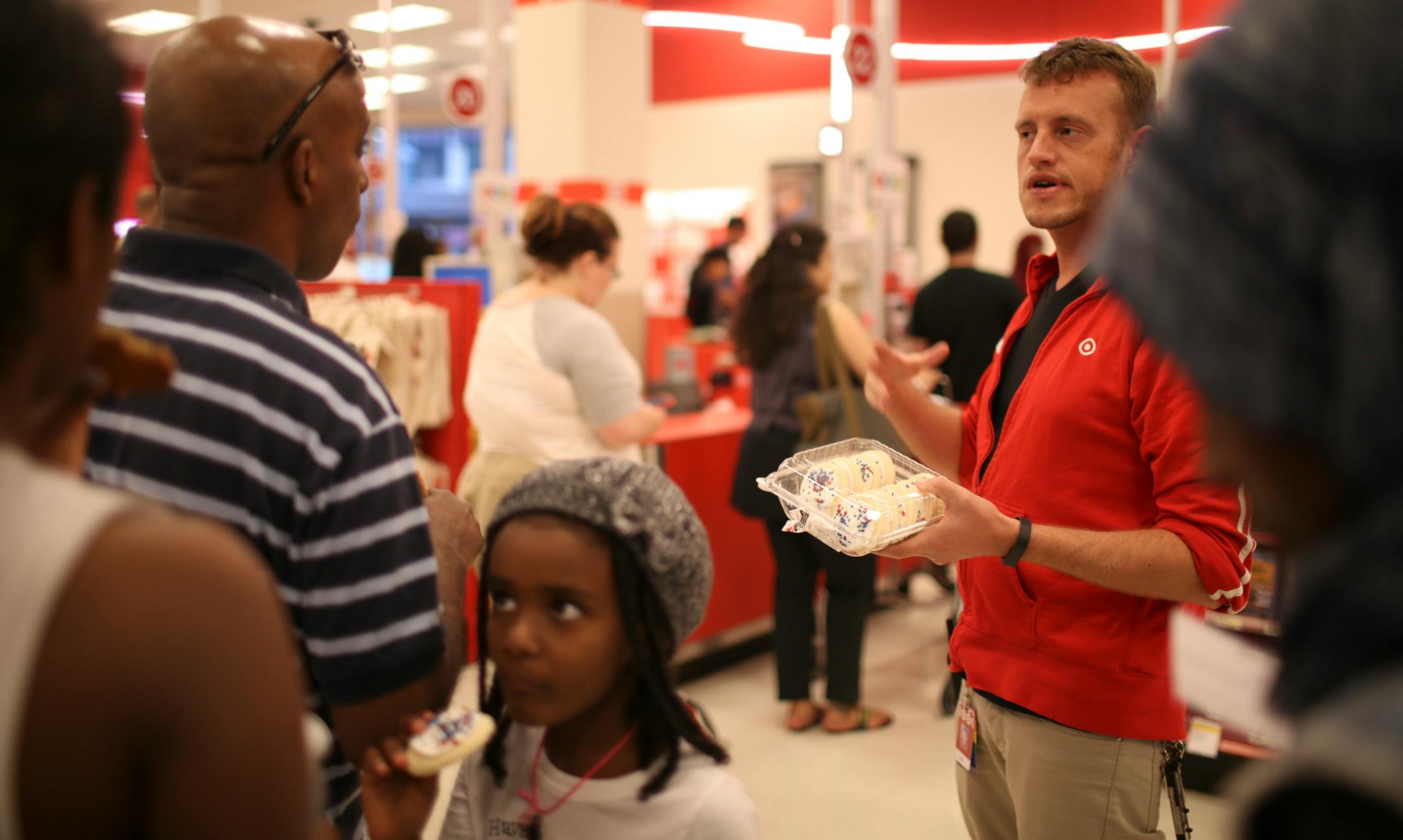 A Target staffer explained the reason for the delays and offered cookies to customers waiting in line to check out at the downtown Minneapolis Target store Sunday night.
