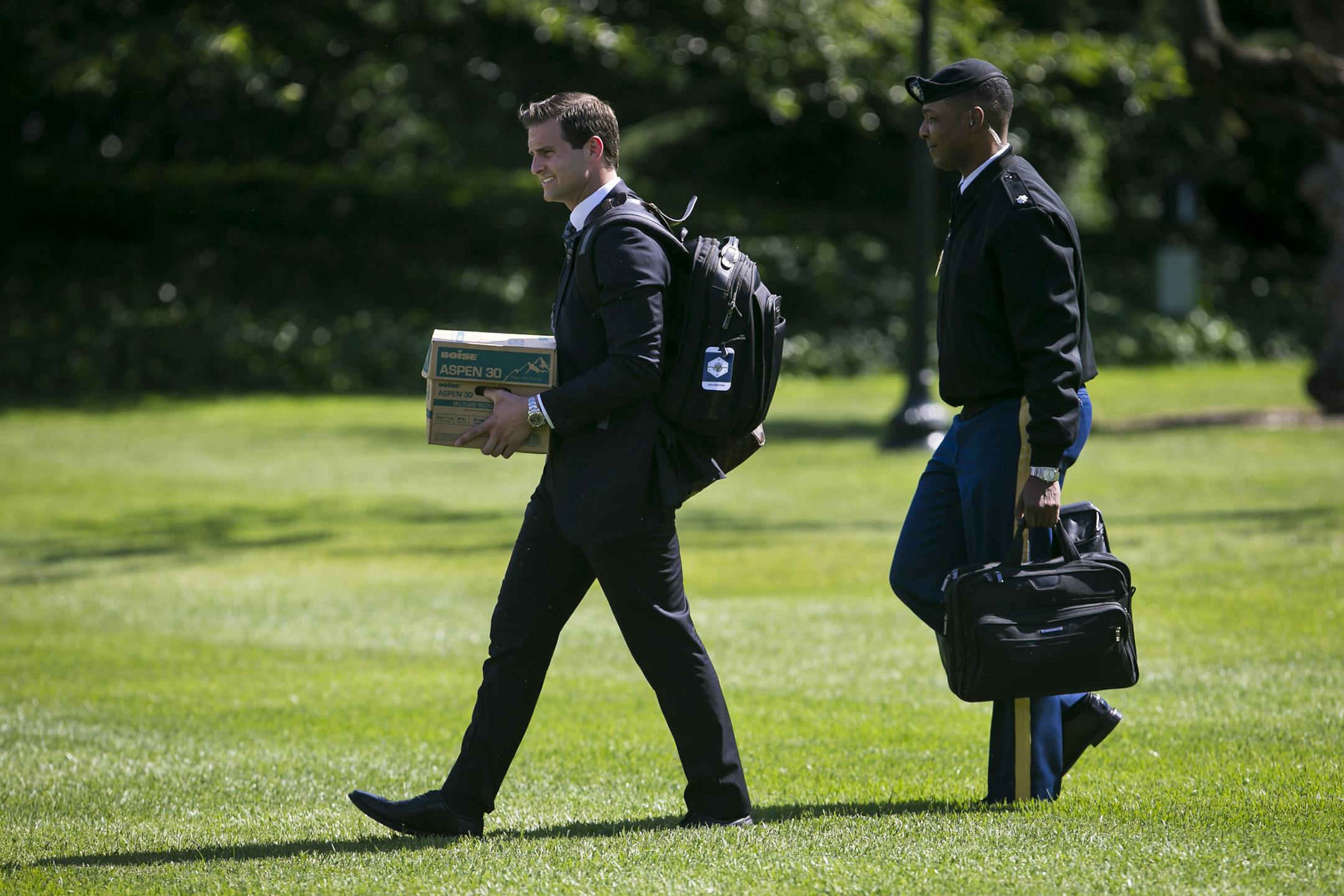 FILE-- John McEntee, President Donald Trump's personal aide, walks to Marine One on the South Lawn of the White House in Washington, June 9, 2017. McEntee, who has served as President Trump’s personal assistant since Trump won the presidency, was forced out of his position and escorted from the White House on March 12, 2018, after his security clearance was revoked, officials with knowledge of the incident said. (Al Drago/The New York Times)
