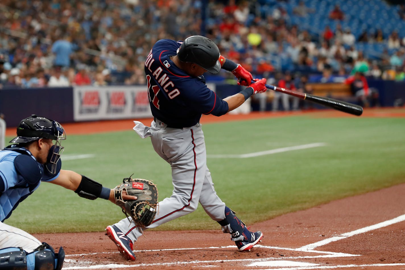 Minnesota Twins' Jorge Polanco hits a double to left agains the Tampa Bay Rays during the first inning of a baseball game Sunday, May 1, 2022, in St. Petersburg, Fla. (AP Photo/Scott Audette)