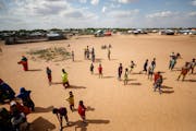 Somali refugee children play outside in an open field at Dadaab refugee camp in northern Kenya in July. Somalis make up the largest share of refugees 