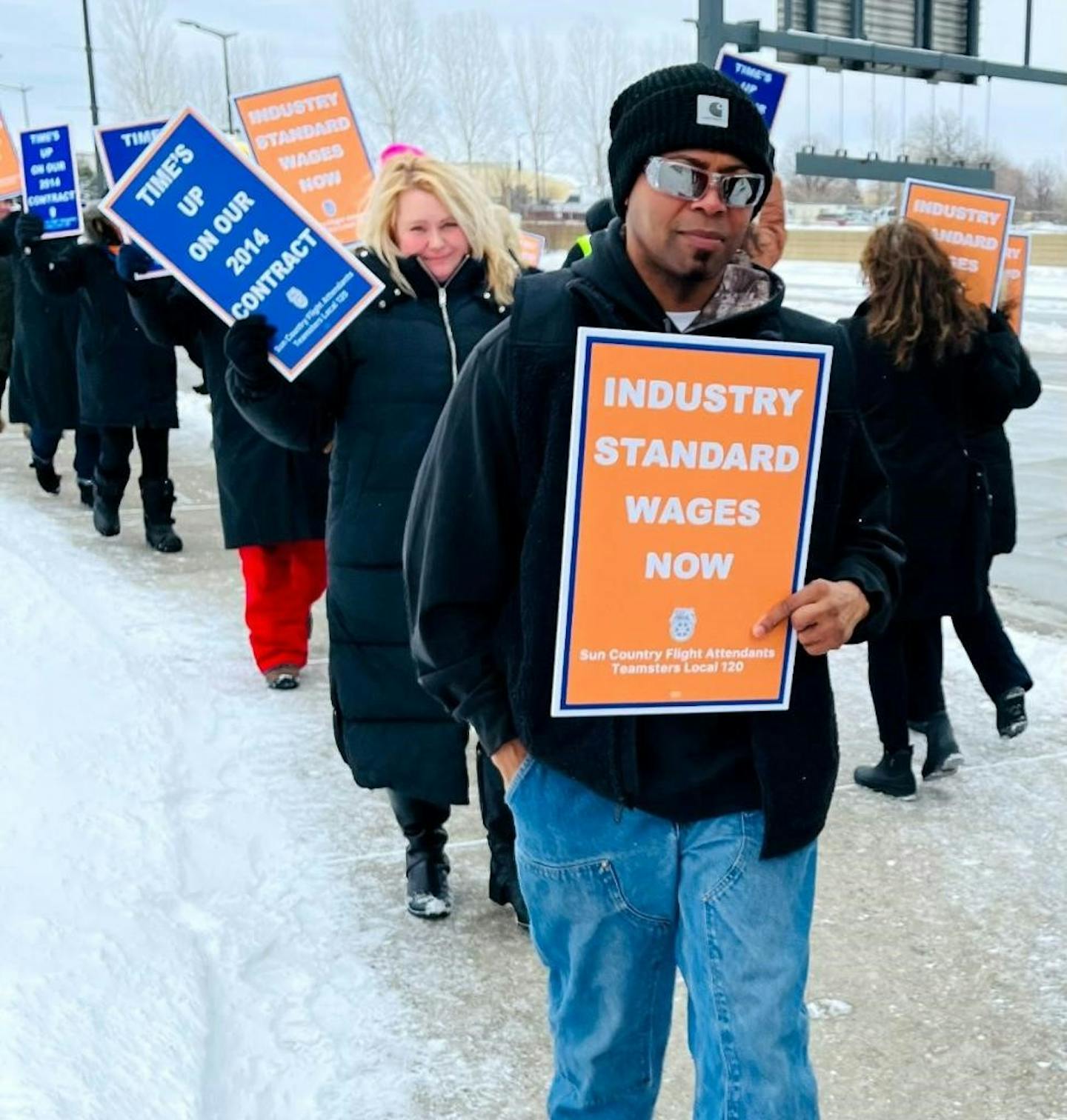 Sly Oliver said he was fired in January from Sun Country Airlines for his support of forming a fleet employees union. He marched in an informational picket last week by Sun Country flight attendants seeking a new contract.