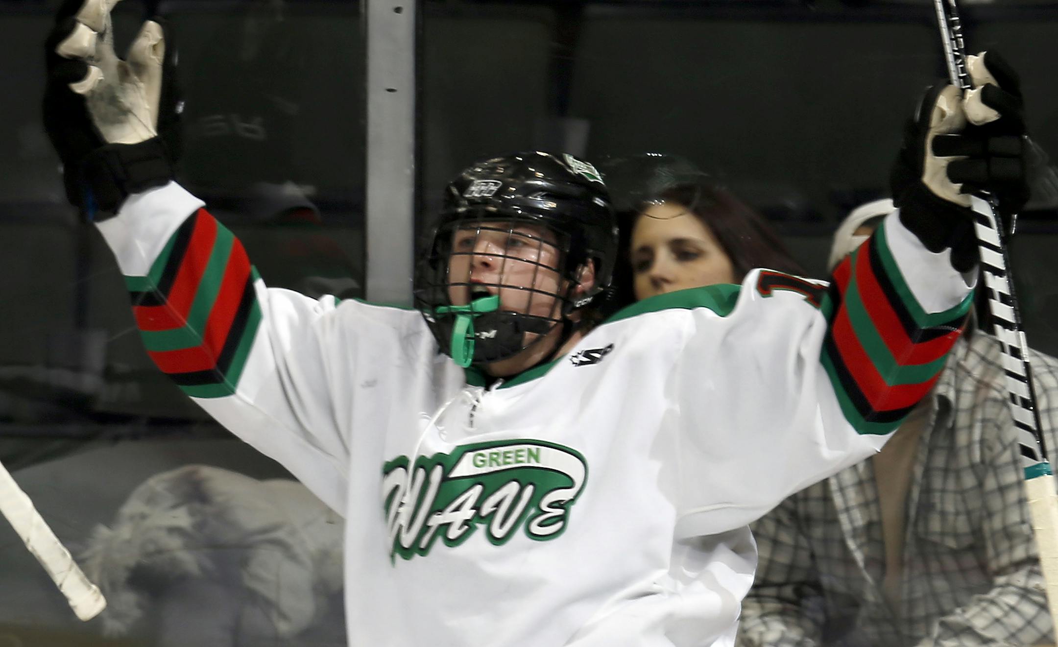 Kolton Aubol (14) of East Grand Forks celebrated after scoring his first of two goals in the first period.