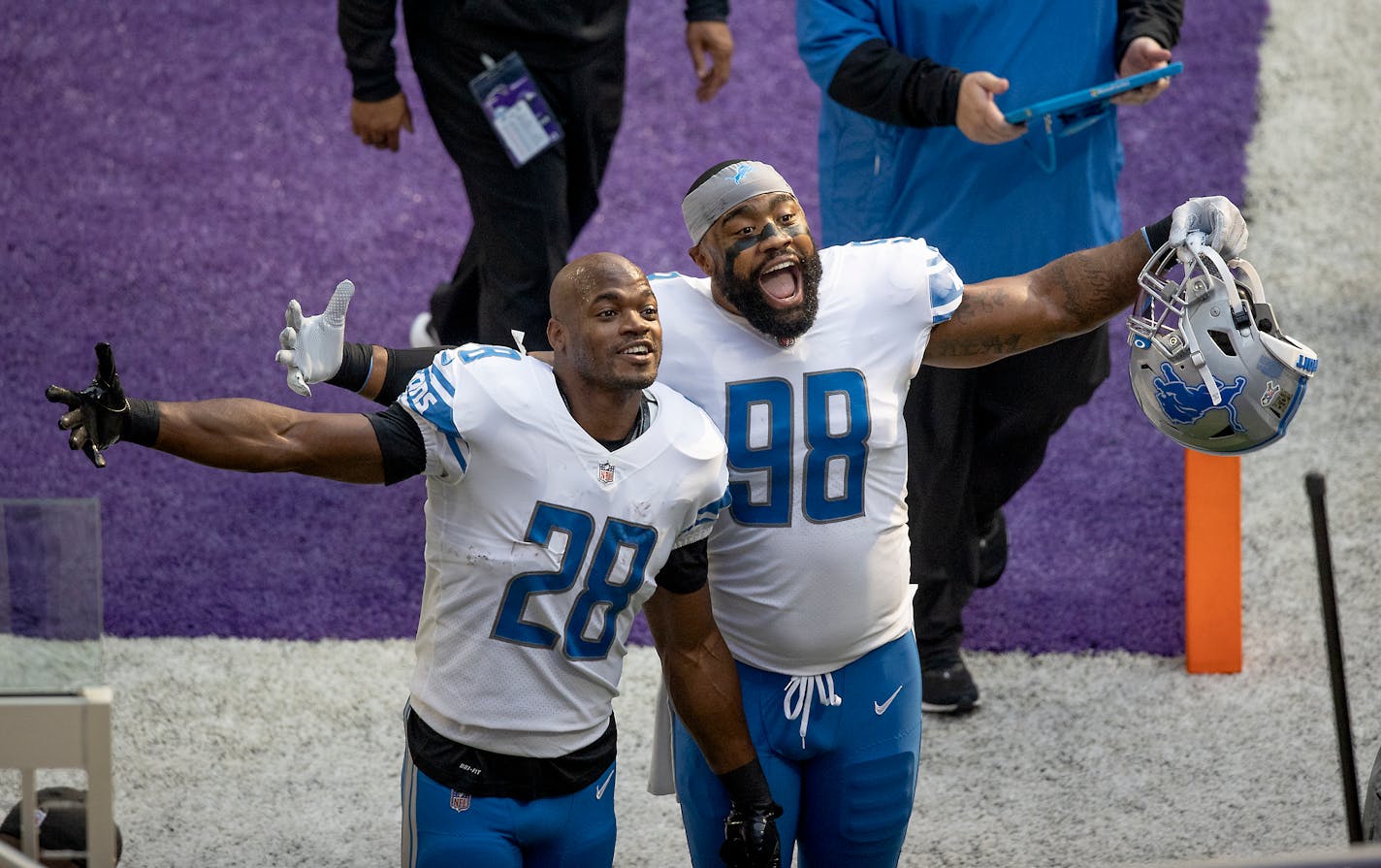 Former Minnesota Vikings players Adrian Peterson, left, and Everson Griffen