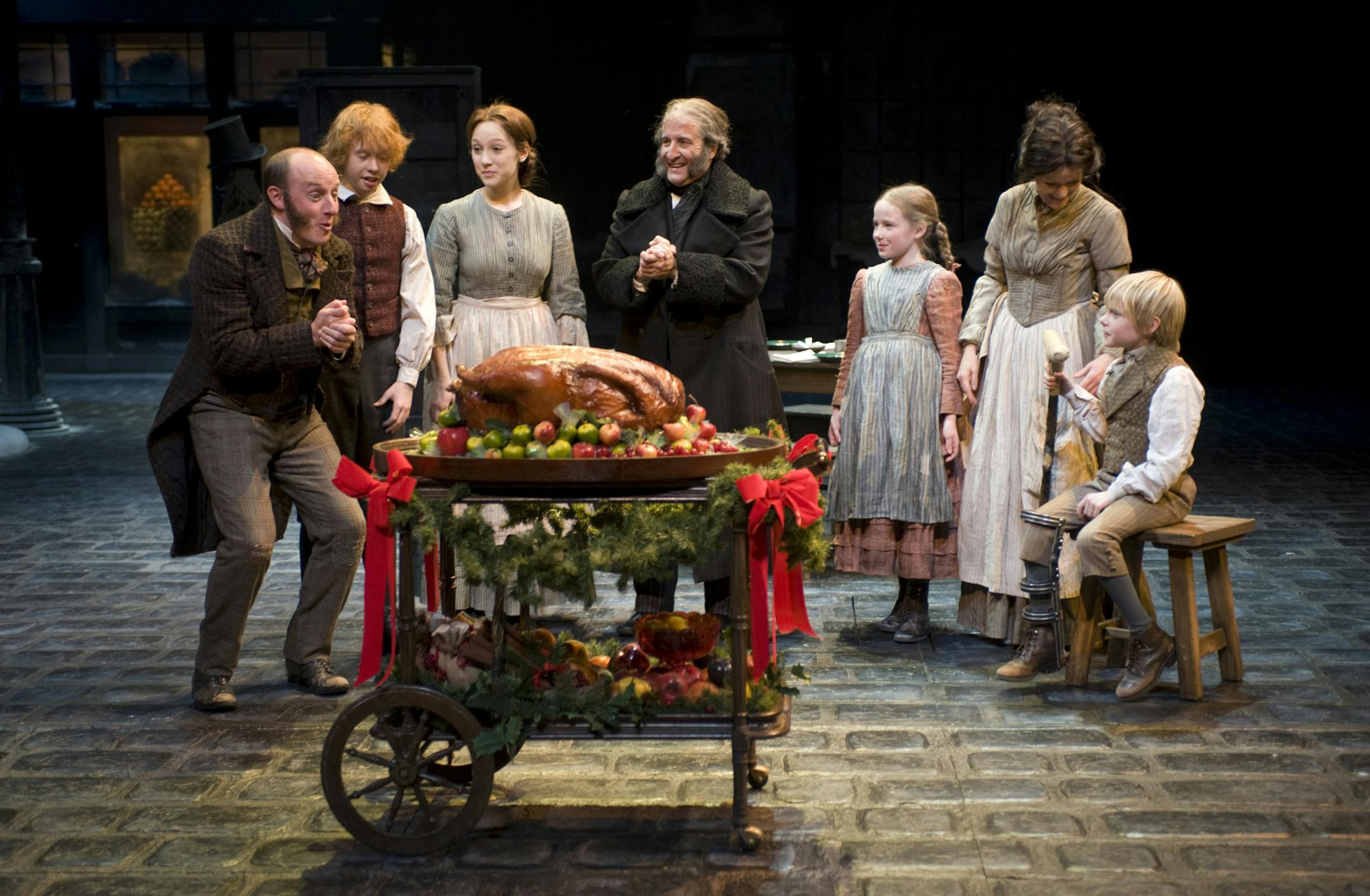 Members of the cast of the Guthrie Theater's production of the Charles Dickens classic "A Christmas Carol," adapted by Crispin Whittell and directed by Joe Chvala with set design by Walt Spangler, costume design by Mathew J. LeFebvre and lighting design by Christopher Akerlind.
