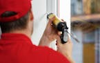 Sealing windows and doors with caulk or weather stripping offers the first line of defense against air loss. (Dreamstime)