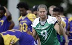 In this photo taken Thursday, Aug. 11, 2016, East Carolina quarterback Philip Nelson (9) calls a play during an NCAA college football practice in Gree
