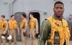 Jonathan Majors stars as a Navy pilot during the Korean War in fact-based “Devotion.”
