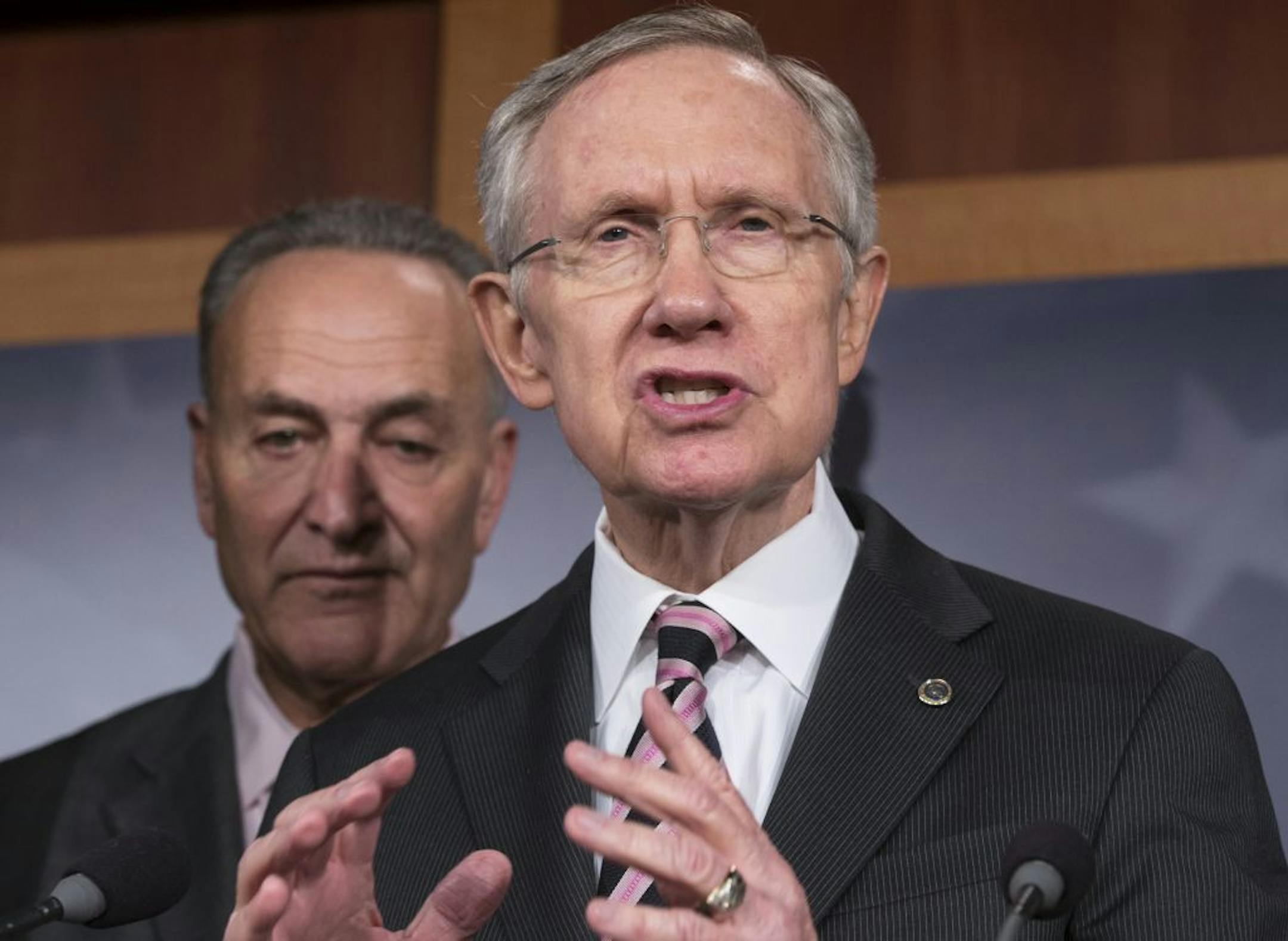Senate Majority Leader Harry Reid, D-Nev., center, and Sen. Chuck Schumer, D-N.Y.