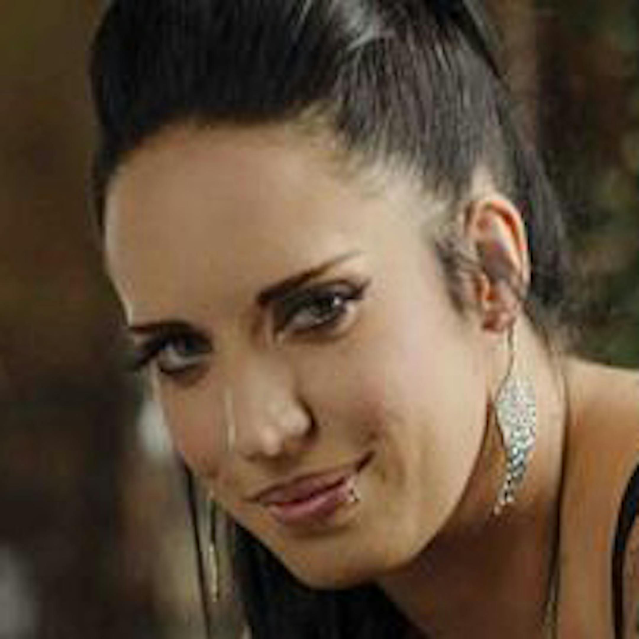 JOLted: “The Voice” singer Kat Perkins is all aflutter when Adam Levine speaks.