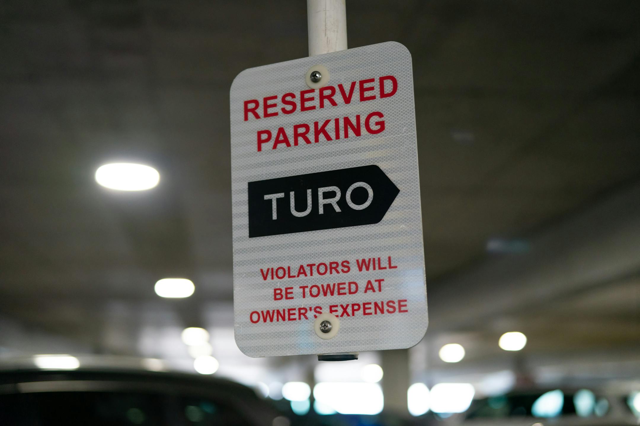 Reserved Turo parking spots in the Red Parking ramp at Minneapolis St. Paul International Airport, Friday, Dec. 17, 2021, Minneapolis, Minn. ] GLEN STUBBE • glen.stubbe@startribune.com
