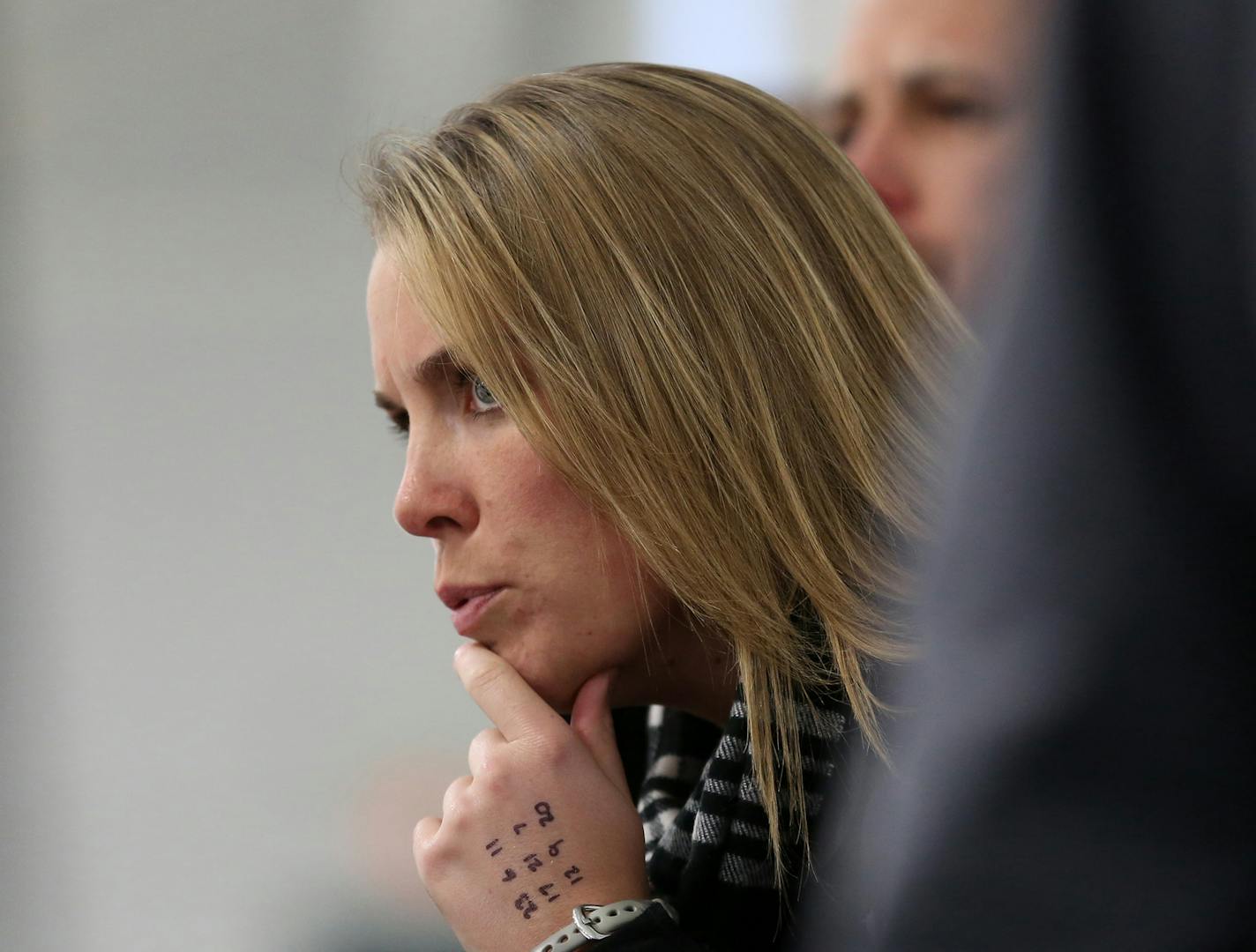 Christina Lee, assistant coach of Eden Prairie gave instruction to players on the bench before their shift. ] (KYNDELL HARKNESS/STAR TRIBUNE) kyndell.harkness@startribune.com Eden Prairie vs. Cretin-Derham Hall girls' hockey game at Highland Arena in St Paul Min., Tuesday, December 23, 2014.