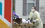Residents of Meridian Manor in Wayzata were evacuated in ambulances and vans April 18 after a coronavirus outbreak was detected.