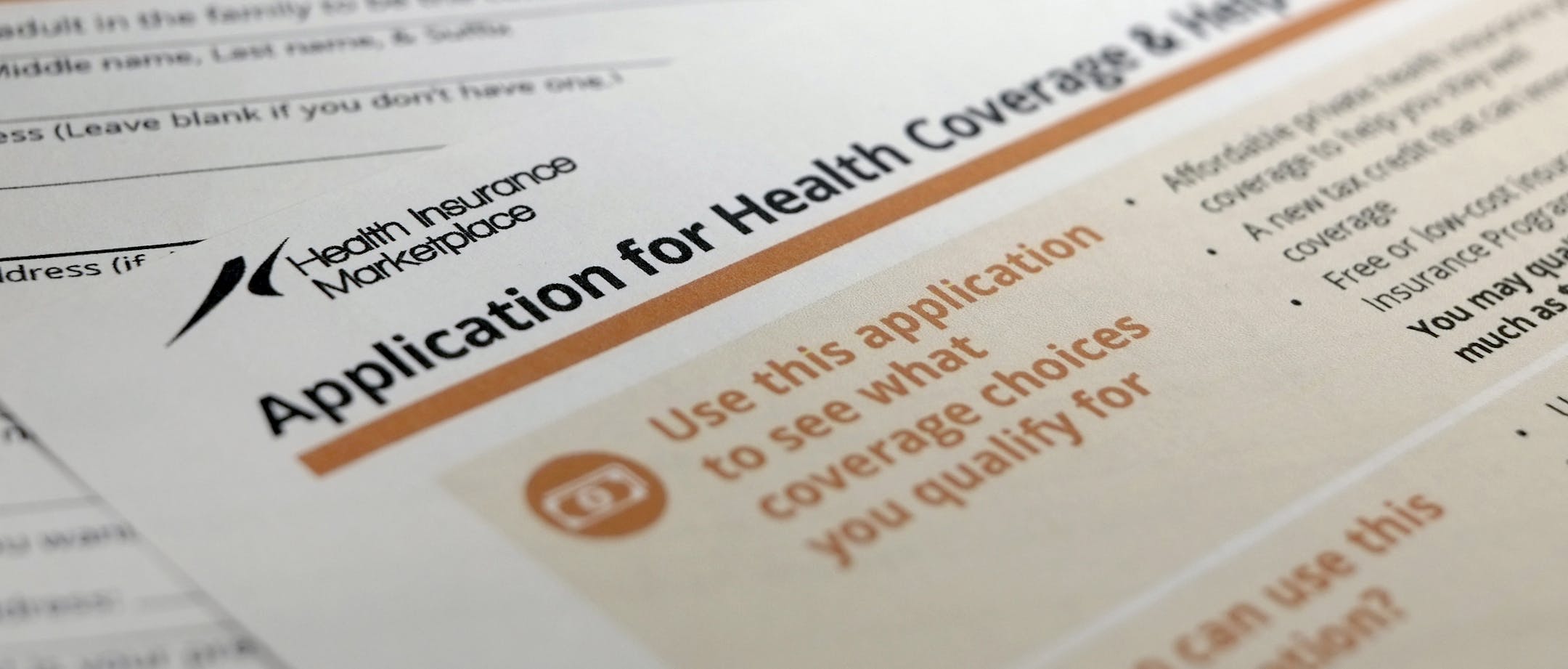 The federal government form for applying for health coverage is photographed in Washington, Wednesday, Sept. 11, 2013. (AP Photo/J. David Ake)