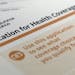 The federal government form for applying for health coverage is photographed in Washington, Wednesday, Sept. 11, 2013. (AP Photo/J. David Ake)