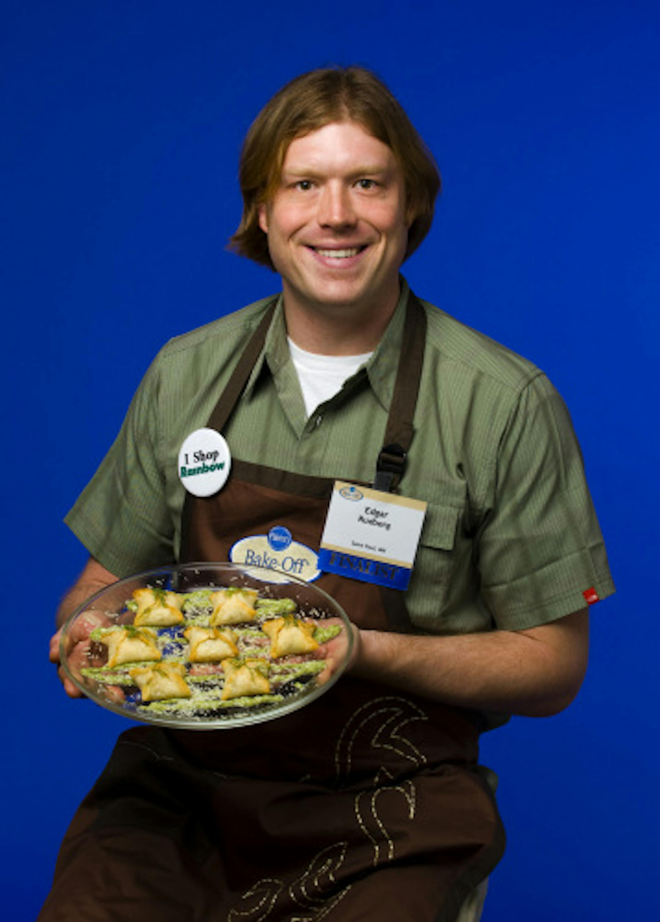 Edgar Rudberg from Saint Paul, MN, poses with his Salmon Pastries with Dill Pesto.