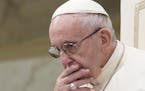 FILE - In this Aug. 22, 2018 file photo, Pope Francis is caught in pensive mood during his weekly general audience at the Vatican. Francis' papacy has