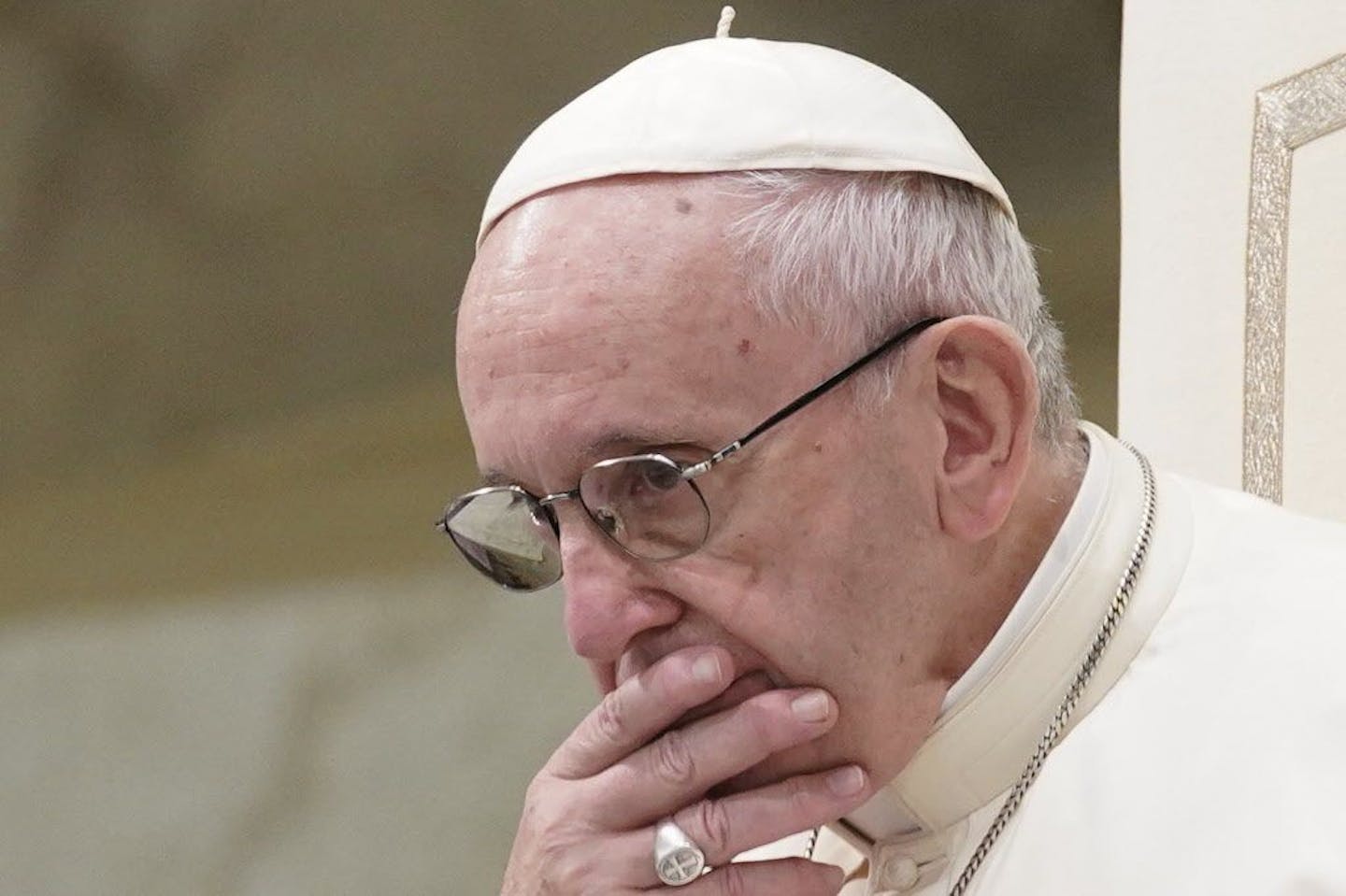 FILE - In this Aug. 22, 2018 file photo, Pope Francis is caught in pensive mood during his weekly general audience at the Vatican. Francis' papacy has been thrown into crisis by accusations that he covered-up sexual misconduct by ex-Cardinal Theodore McCarrick.