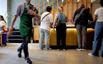 A Starbucks in New York. “It’s not just Walmart,” writes Adelle Waldman. “Target, TJX Companies, Kohl’s and Starbucks all describe their med