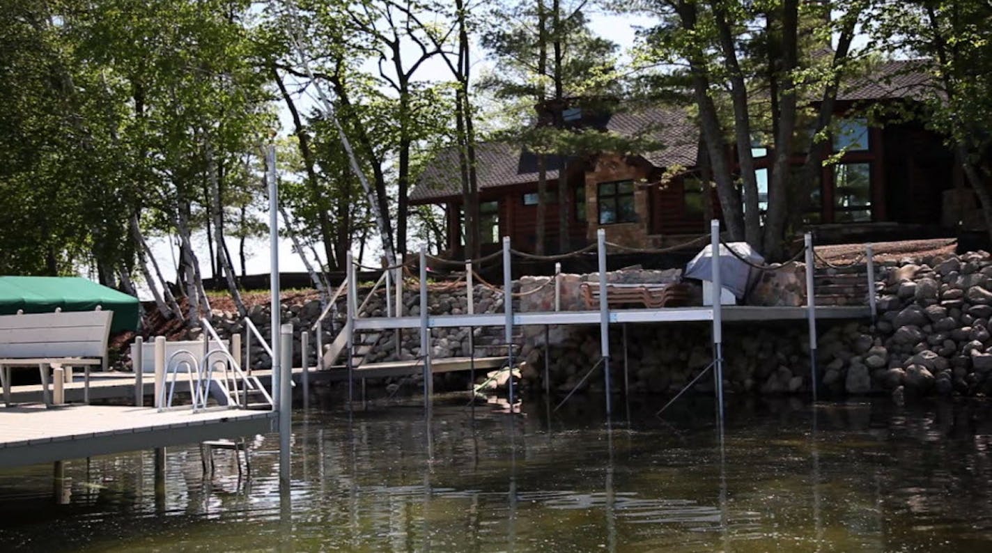 This dock platform on Cross Lake is illegally large.