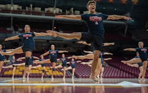 Matt Greco and members of the U of M dance team during practice at Williams Arena in Minneapolis on April 7, 2025.
The U of M dance team will be r