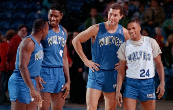 Minnesota Timberwolves players, Sidney Lowe, Sam Mitchell, Tod Murphy and Pooh Richardson before the Wolves played the Los Angeles Lakers during an ex