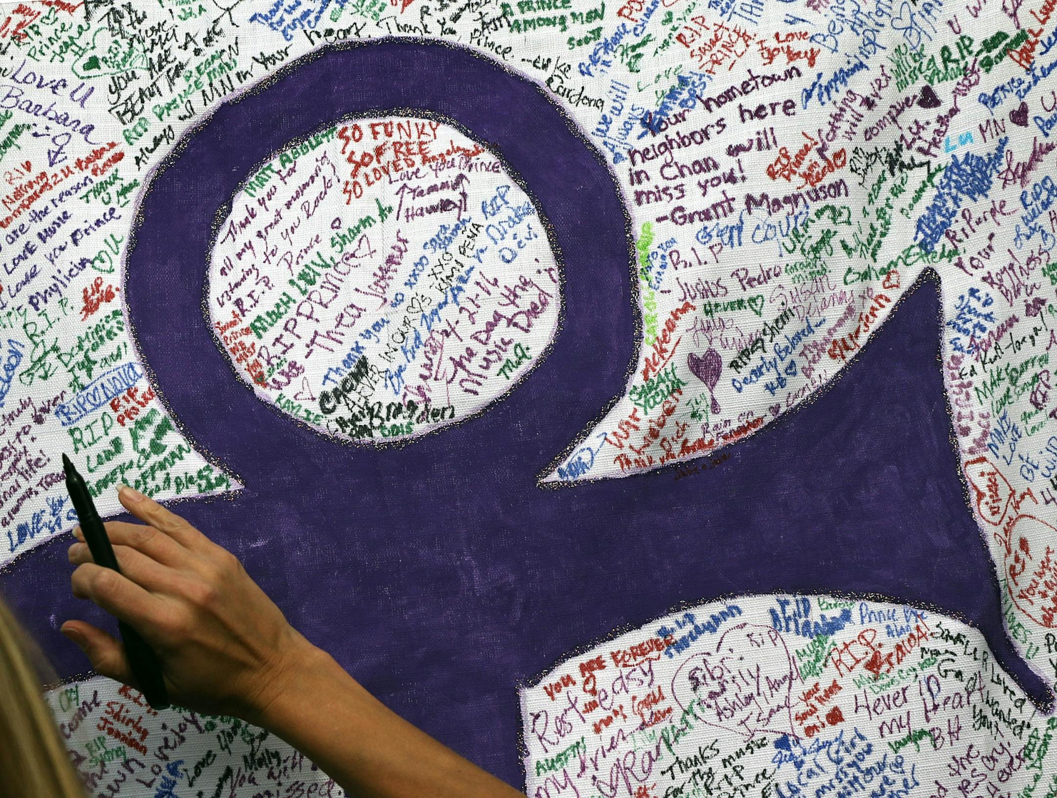 Mourners of Prince continued to flock to the site of a makeshift memorial outside Paisley Park in Chanhassen.