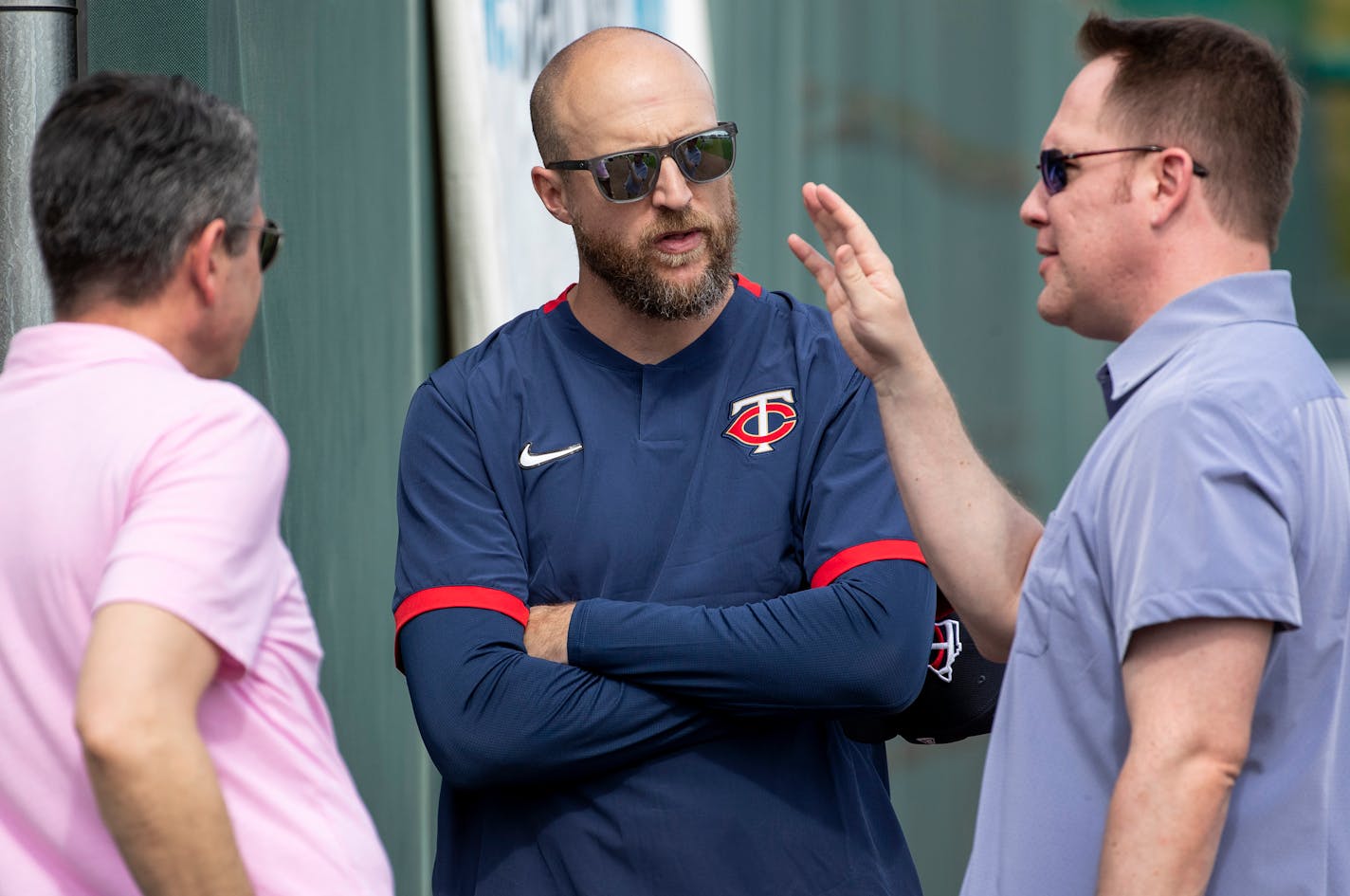 Minnesota Twins senior VP and general manager Thad Levine, manager Rocco Baldelli and executive vice president and chief baseball officer Derek Falvey.