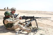 Troops from the U.S. Army's 3rd Brigade Combat Team instructed Iraqi soldiers how to use M2 machine guns at Besmaya Range Complex, Iraq.