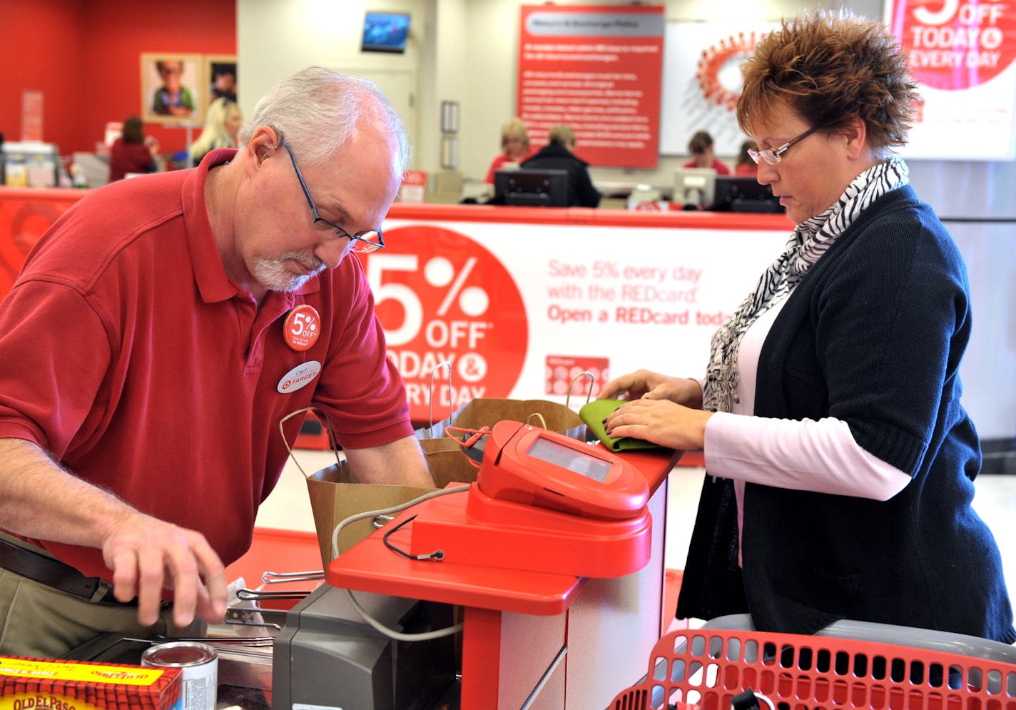 Tracy Gohlke, right, shopped the Super Target on Pilot Knob in Apple Valley.