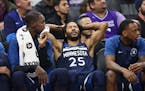 Minnesota Timberwolves guard Derrick Rose (25) sits on the bench late in the second half of the team's NBA basketball game against the Sacramento King