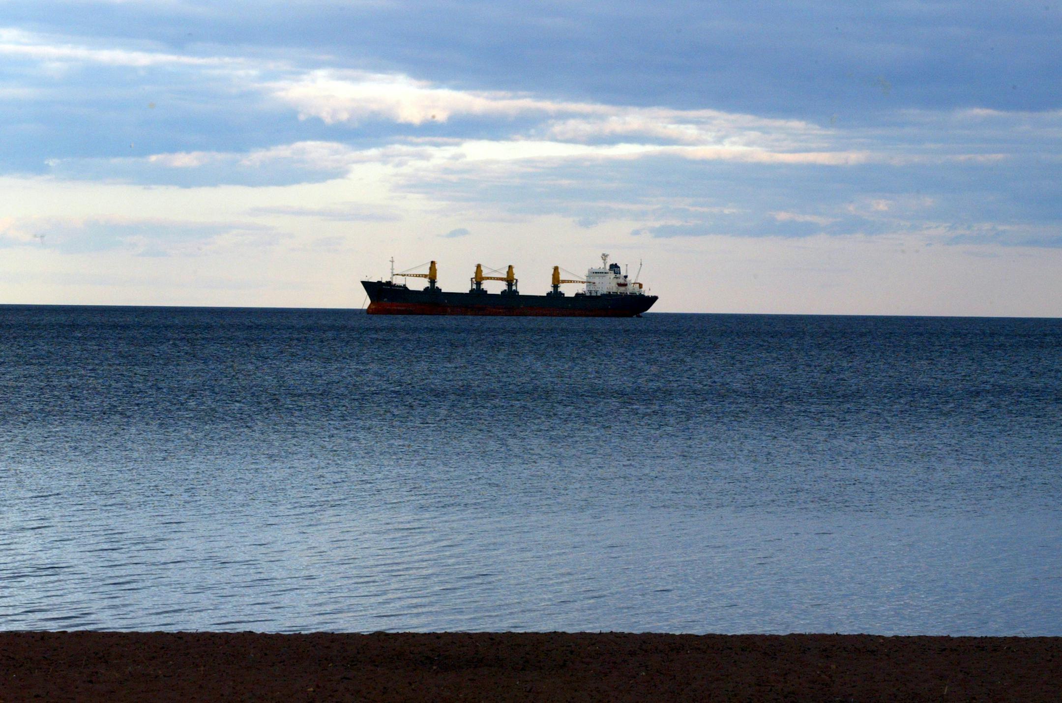 A freighter makes its way towards Duluth harbor to pick up a load of cargo.