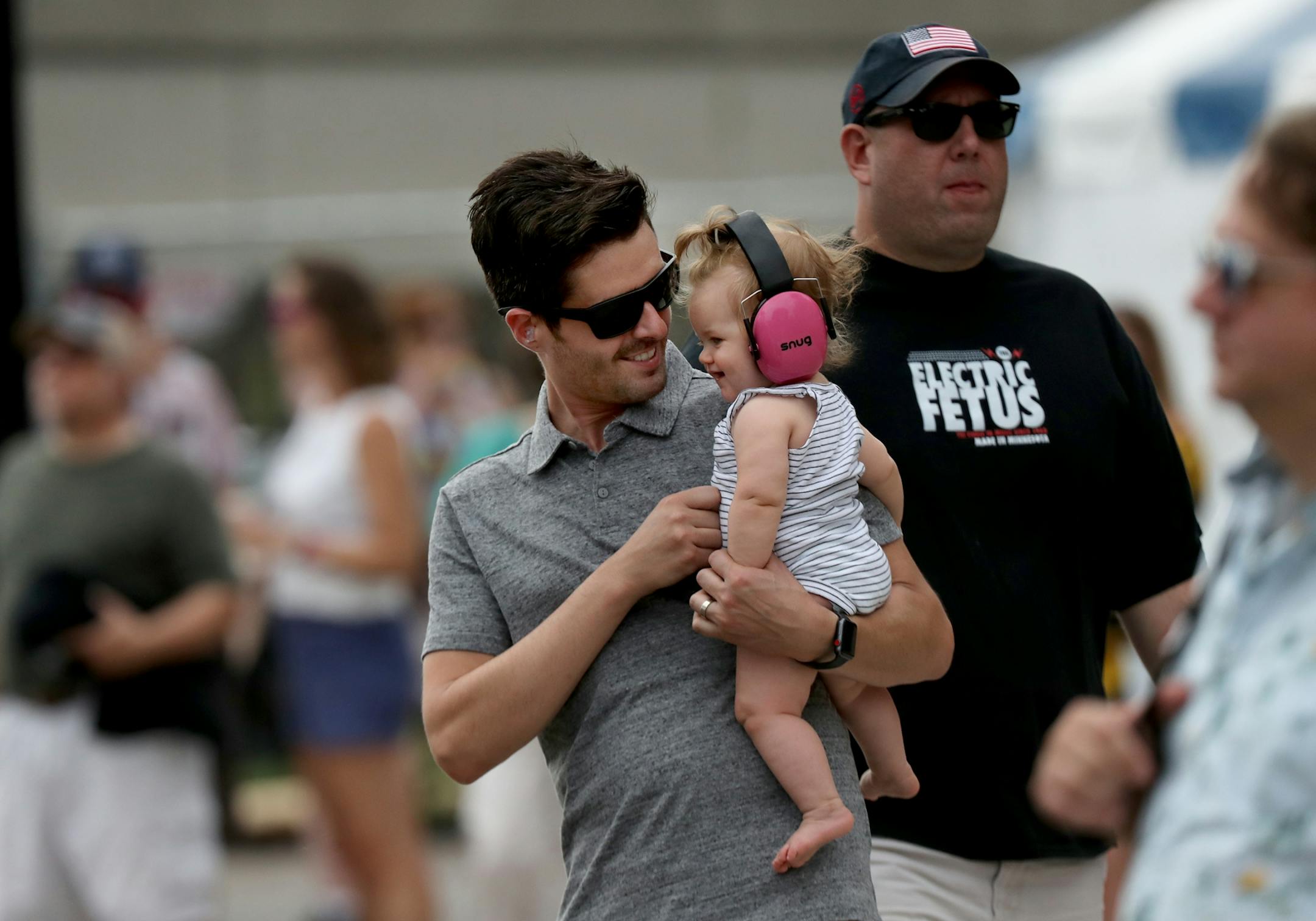 Dave Roberts of Eagan made sure his daughter Miriam's first concert listening to Now, Now was a safe and enjoyable one with ear protection for his 9 month-old at the Basilica Block Party at the Basilica of St. Mary Friday, July 6, 2018, in Minneapolis, MN.