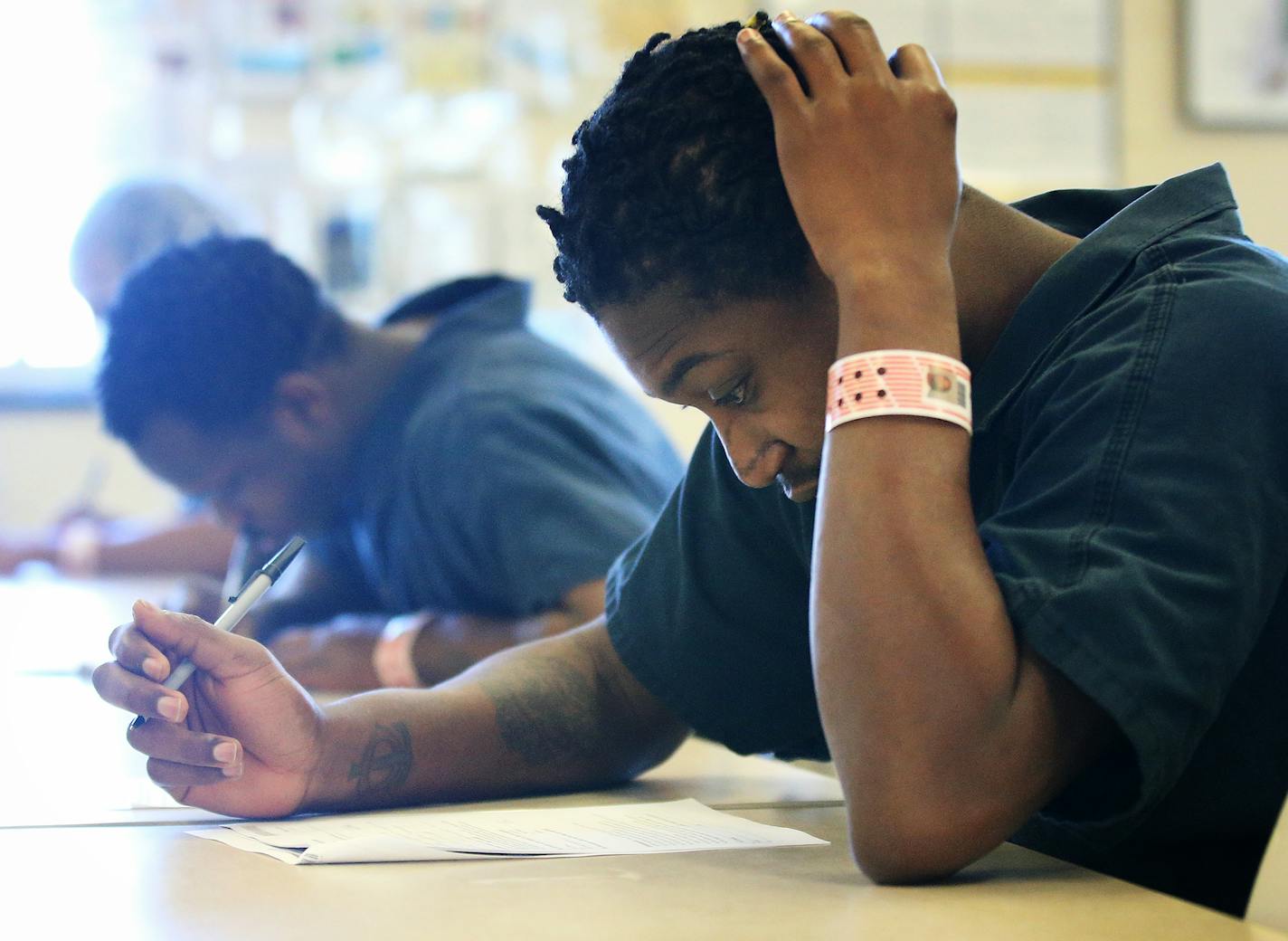 A Portico Healthnet adviser assisted people signing up for health insurance at the Ramsey County jail.