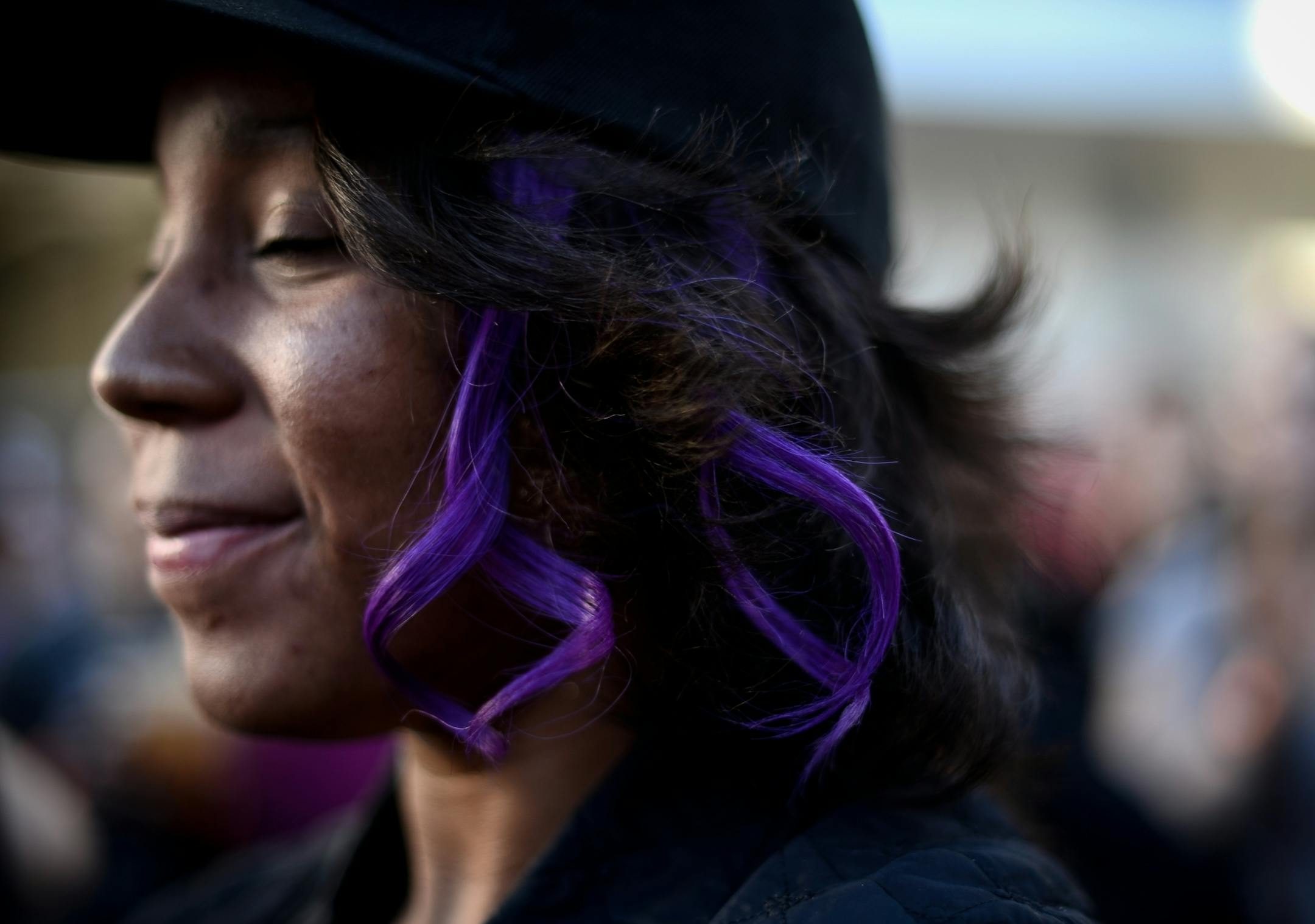 Kristin Flowers, of Los Angeles, listened to music at Saturday's Prince memorial block party at First Ave.