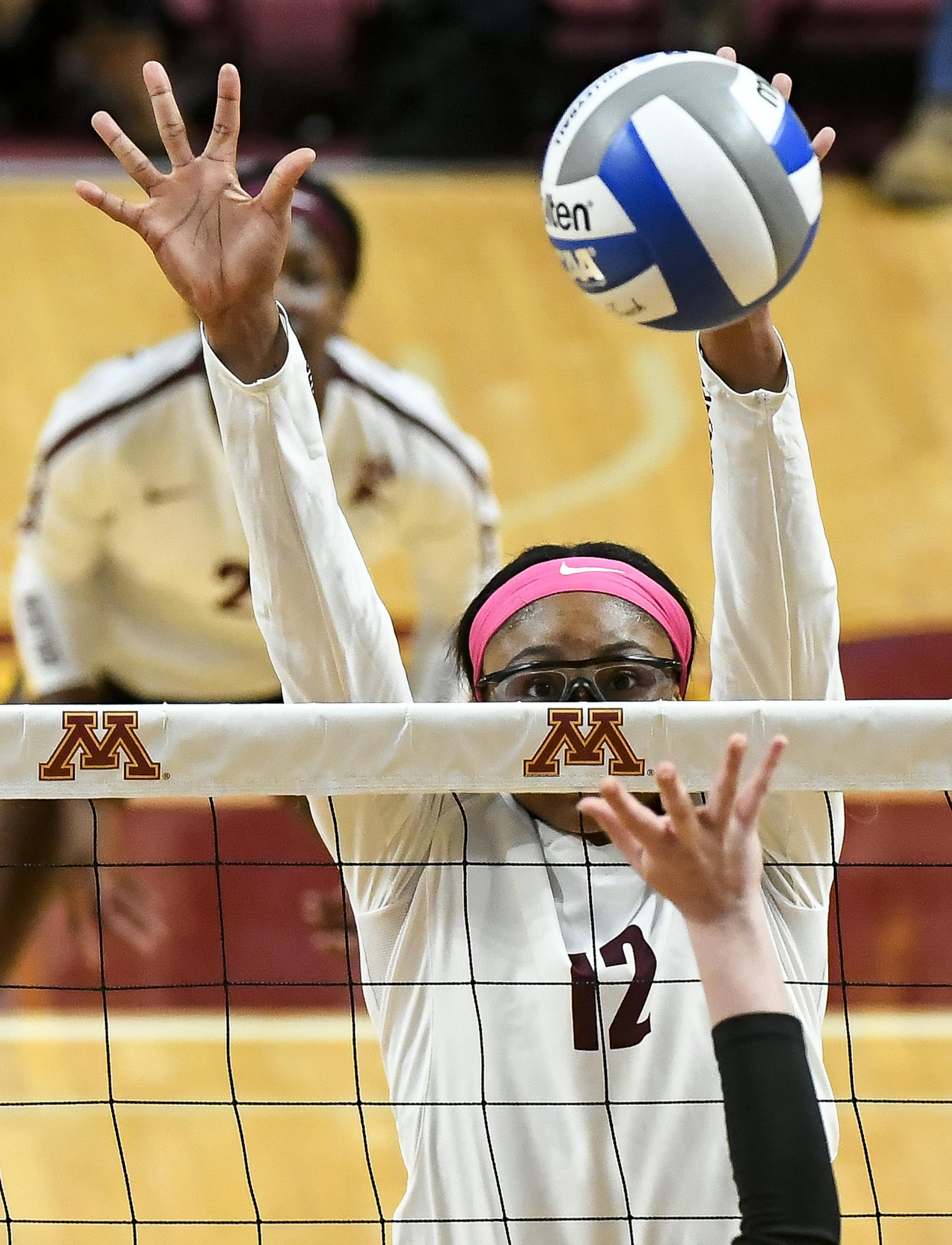 Minnesota middle blocker Taylor Morgan (12) blocked a Bryant spike in the first set Friday night. ] Aaron Lavinsky • aaron.lavinsky@startribune.com The University of Minnesota Golden Gophers volleyball team played the Bryant University Bulldogs in an NCAA Tournament game on Friday, Nov. 30. 2018 in the Maturi Sports Pavilion at the University of Minnesota in Minneapolis, Minn.
