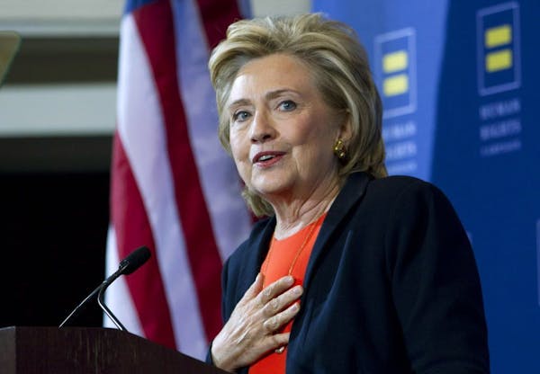 Democratic presidential candidate Hillary Rodham Clinton gestures as she speaks at Human Rights Campaign gathering in Washington on Oct. 3, 2015.