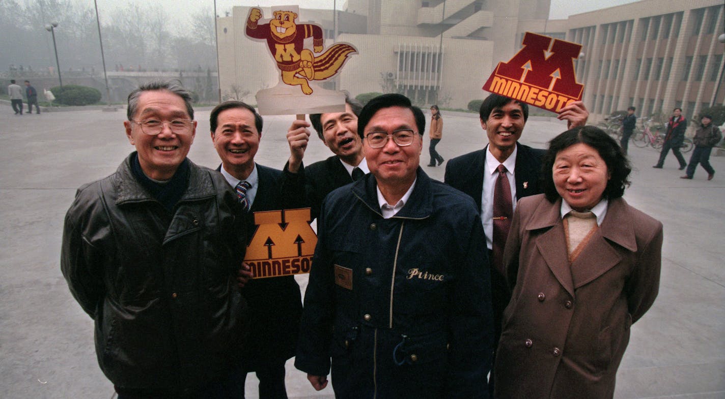 In 1998, members of Xi'an University of Minnesota Alumni chapter showed off mementos from former U President Nils Hasselmo's visit. The U's connection to China stretches several decades – the U sent its first delegation in 1979.