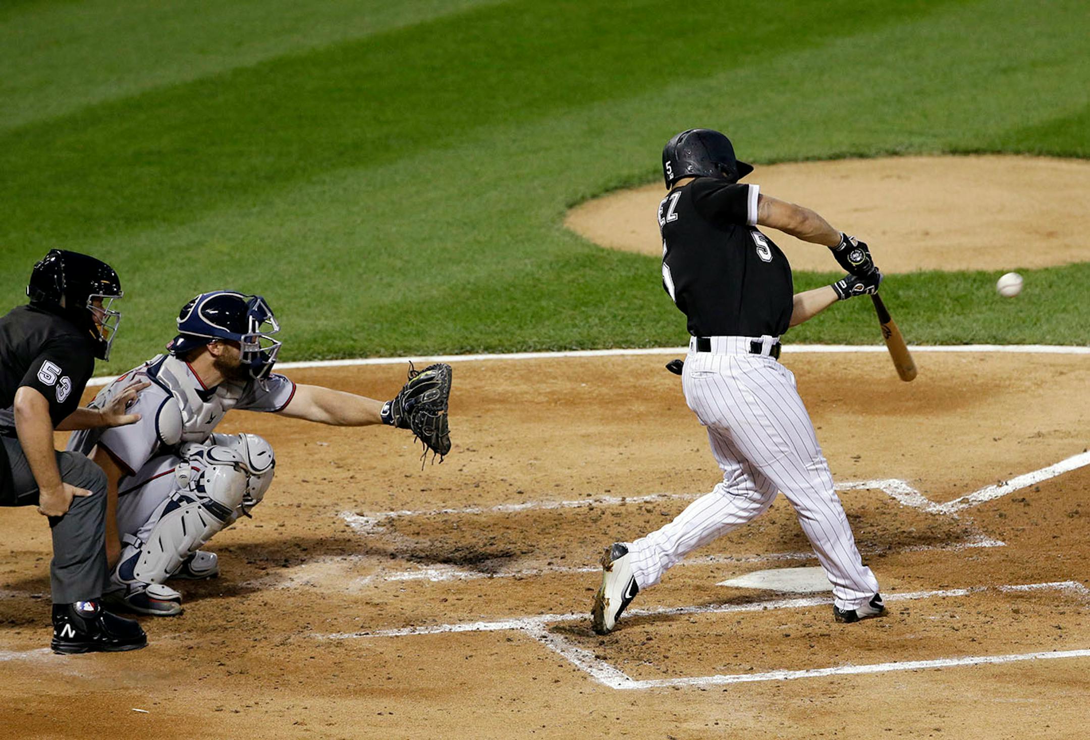 Chicago White Sox's Yolmer Sanchez hits a solo home run during the second inning of a baseball game against the Minnesota Twins, Thursday, Aug. 24, 2017, in Chicago.