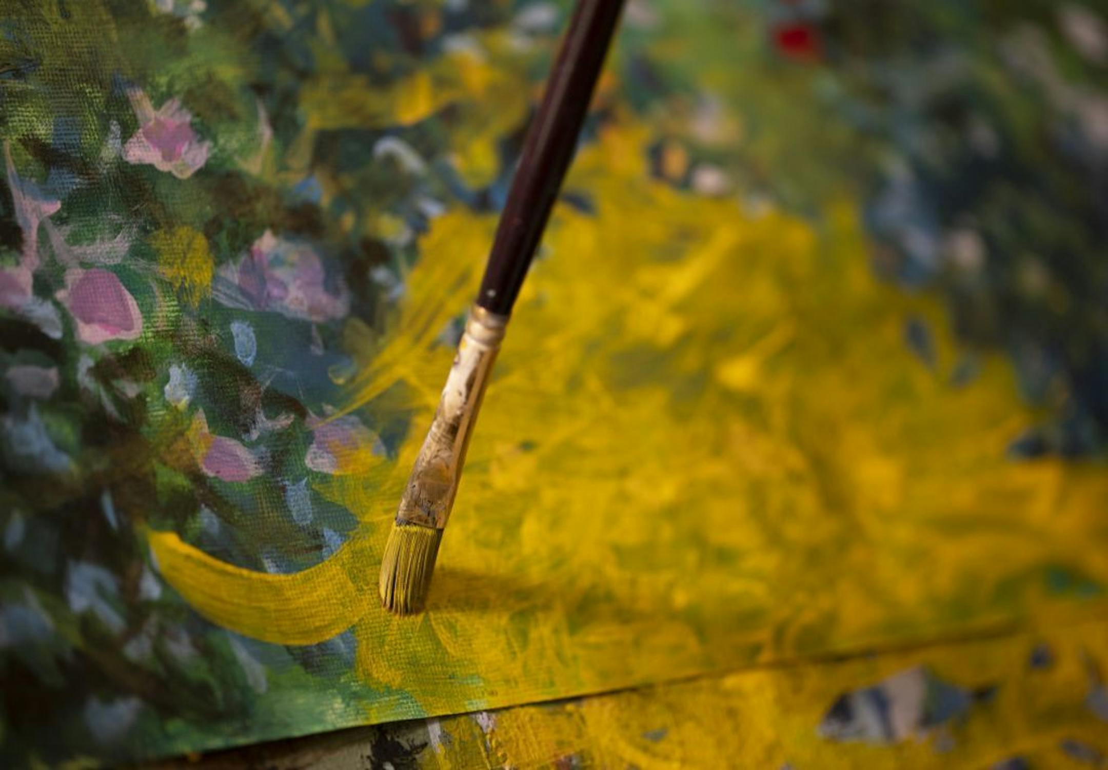 Kari Wagner worked on a painting in her home studio.