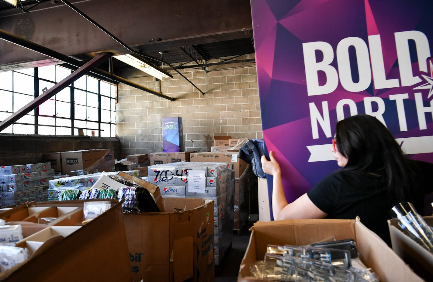 Michelle Wong, marketing director for The Salvation Army showed some of the donated items from Super Bowl LII that will be sold or distributed to other non-profits. ] GLEN STUBBE &#x2022; glen.stubbe@startribune.com Wednesday, February 14, 2018 The Salvation Army and a handful of other charities are helping to divert waste from the Super Bowl, from 5 miles of mesh fencing to office furniture and clothing. Many non-branded items will be utlized by charities, but Salvation Army will start auctioni