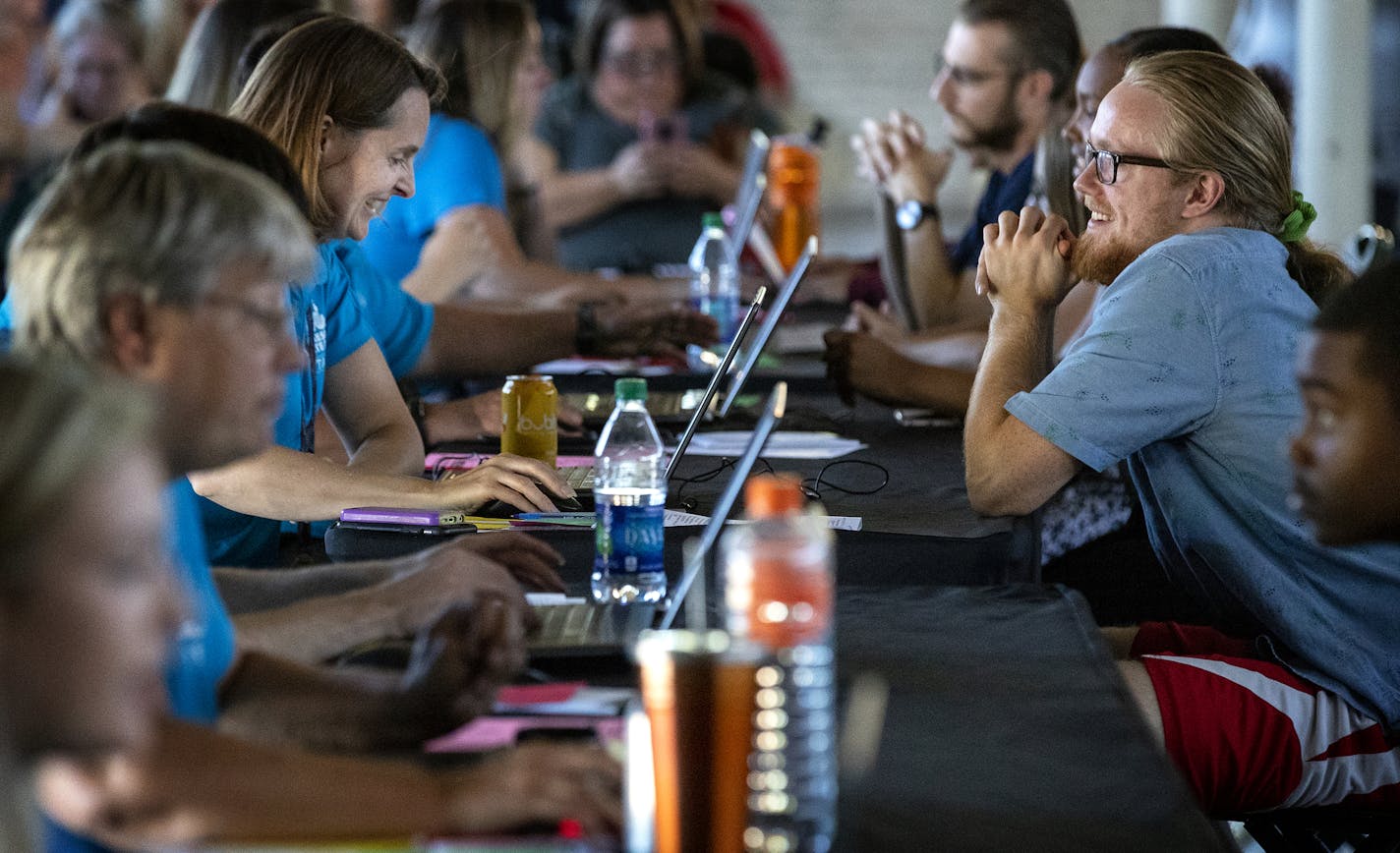 Interviews at multiple tables were conducted interview at the Minnesota State Job Fair on Tuesday. ] CARLOS GONZALEZ &#xef; cgonzalez@startribune.com &#xf1; July 17, 2018, Falcon Heights MN, Minnesota State Fair, The Minnesota State Job Fair - (it's the third annual job fair).