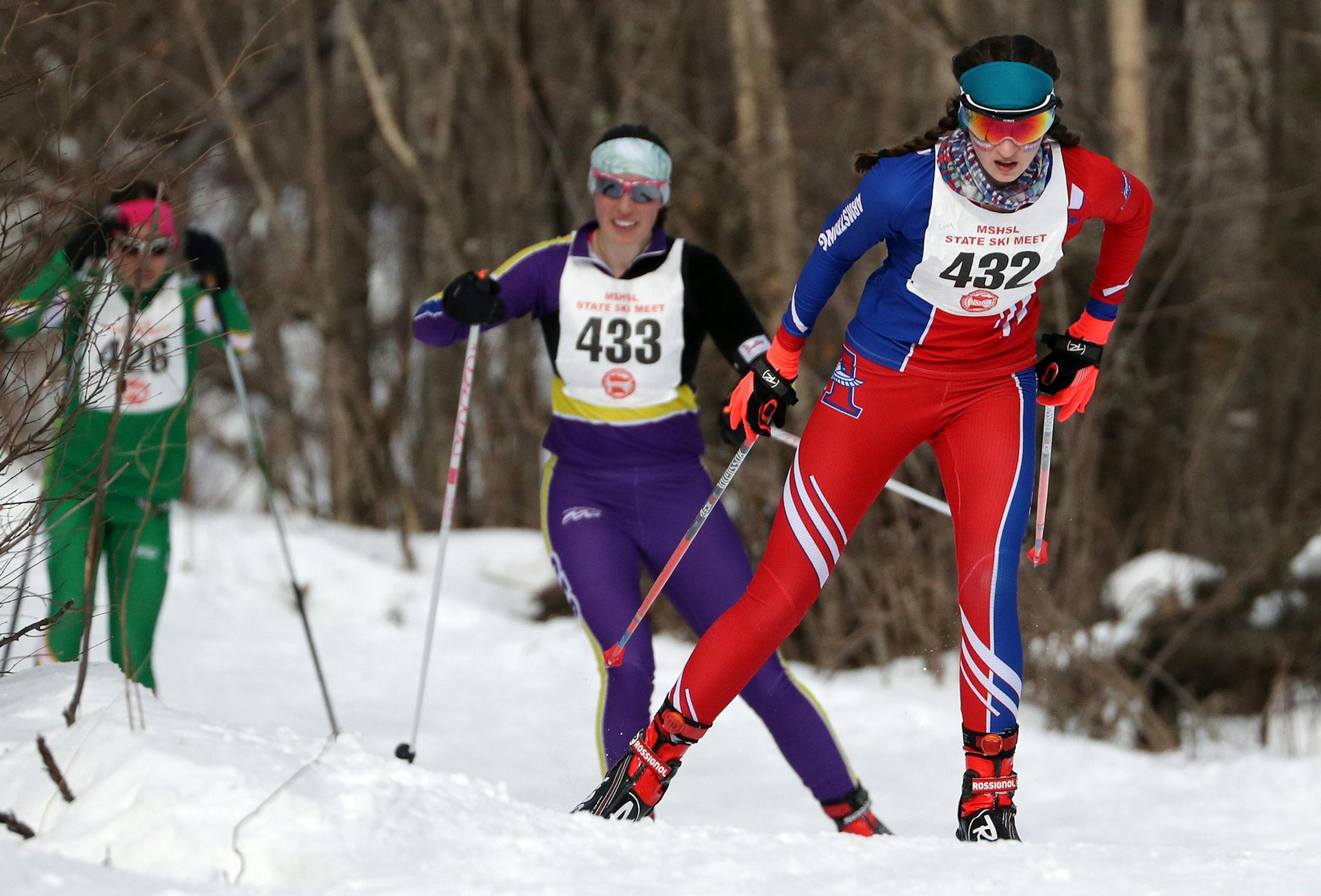 Lucinda Anderson, right, of Robbinsdale Armstrong competes during the girl's 5k freestyle race Thursday. ] ANTHONY SOUFFLE &#xef; anthony.souffle@startribune.com High school skiers competed during the nordic skiing state meet Thursday, Feb. 16, 2017 at Giants Ridge in Biwabik, Minn.