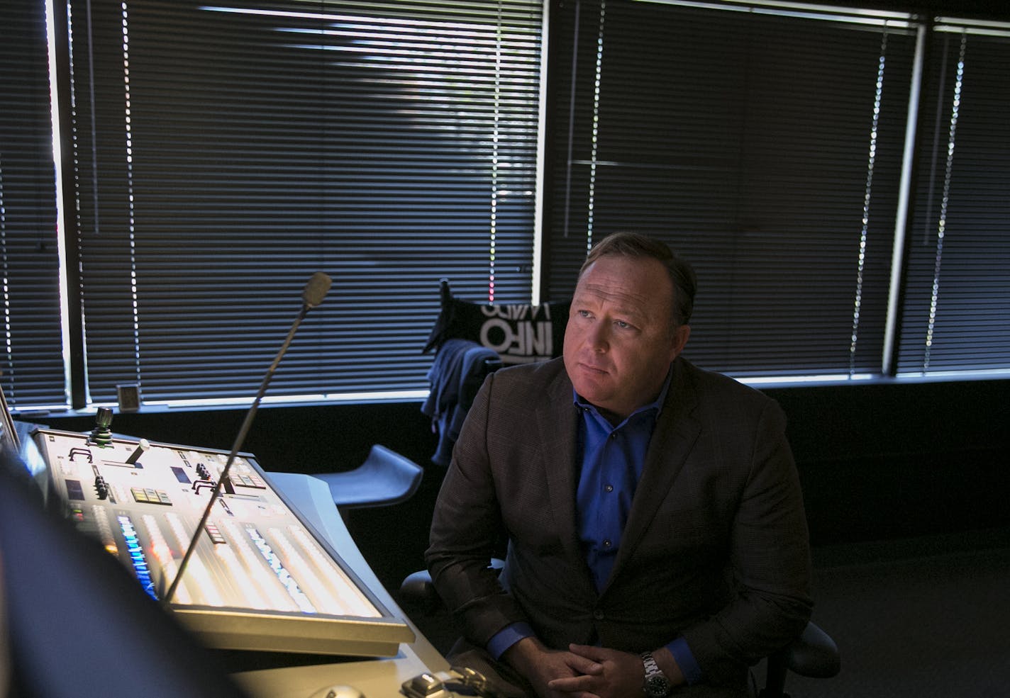 FILE -- Alex Jones, the right-wing conspiracy theorist, in his control room in Austin, Feb. 17, 2017. In a friend of the court brief, six free speech scholars argued that the First Amendment does not protect the conspiracy theories of Jones. (Ilana Panich-Linsman/The New York Times)