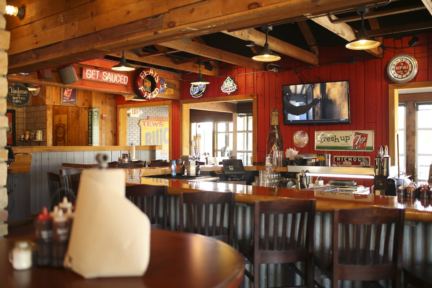 The bar area at the Famous Dave's location in Maple Grove shown in a September 2016 file photo. (Staff photo by Jeff Wheeler) To counter sales declines, Famous Dave's is refreshing their branding, starting with their Maple Grove location. Founder Dave Anderson and Chief Marketing Officer Alfredo Martel were on hand for the launch event Tuesday evening, September 20, 2016. ORG XMIT: MIN1609201715291327