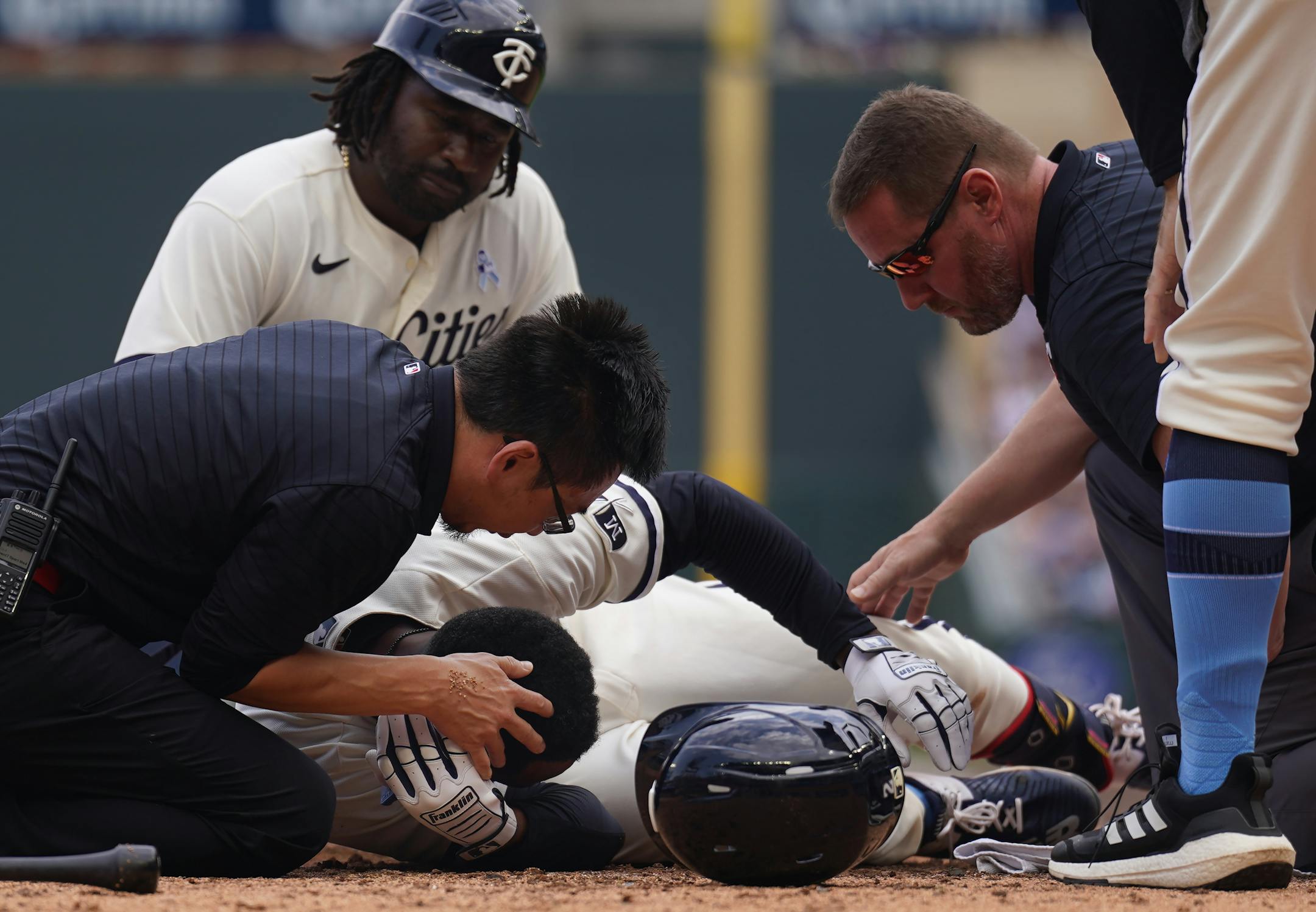 Minnesota Twins center fielder Michael A. Taylor (2) is hit in the head in the 8th inning.