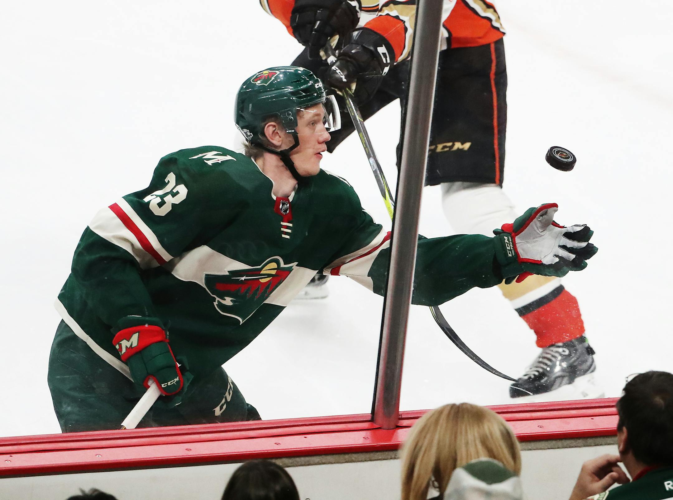 The Minnesota Wild's Gustav Olofsson (23) tries to glove the puck against Anaheim. The Ducks went on for a 3-2 win over the Wild Saturday, Feb. 17, 2018, at the Xcel Energy Center in St. Paul, MN.Saturday, Feb. 17, 2018, at the Xcel Energy Center in St. Paul, MN. ] DAVID JOLES &#xef; david.joles@startribune.com Wild versus Anaheim
