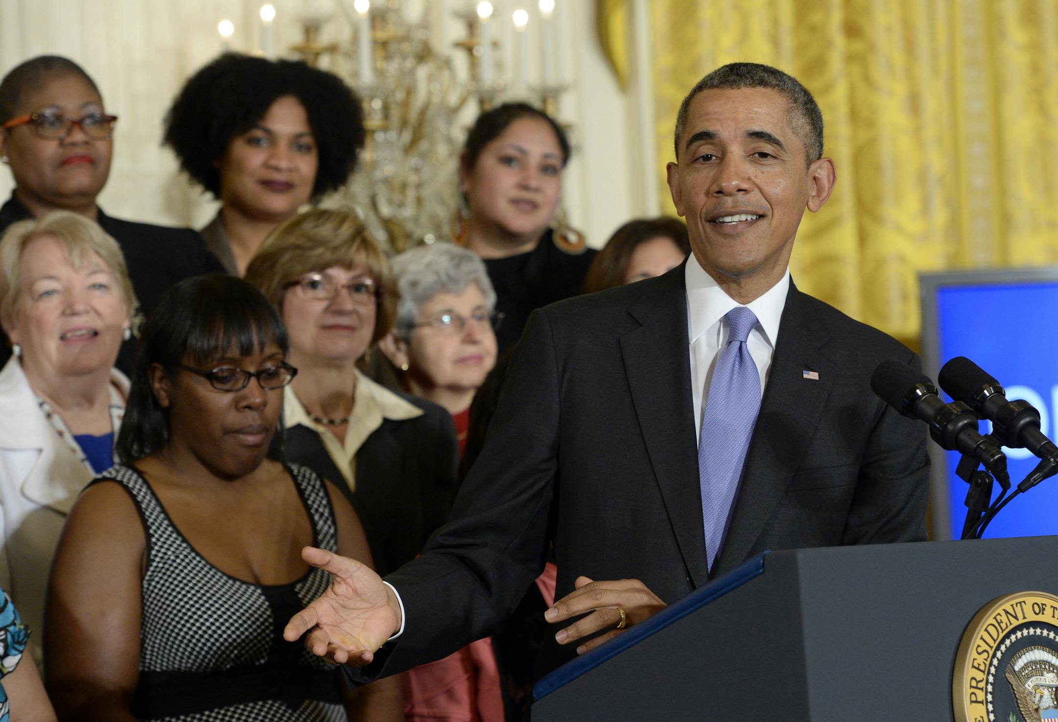President Barack Obama speaks in the East Room of the White House in Washington, Tuesday, April 8, 2014, during an event marking Equal Pay Day. Obama announced new executive actions to strengthen enforcement of equal pay laws for women. The president and his Democratic allies in Congress are making a concerted election-year push to draw attention to women's wages. (AP Photo/Susan Walsh)